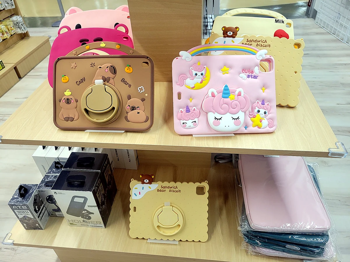 Cute and protective kids tablet cases displayed on a shop shelf